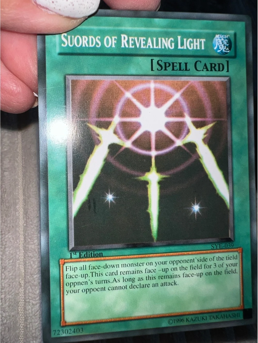 Yu-Gi-Oh! 1st Edition Super Rare Suords swords of Revealing Light misspelling
